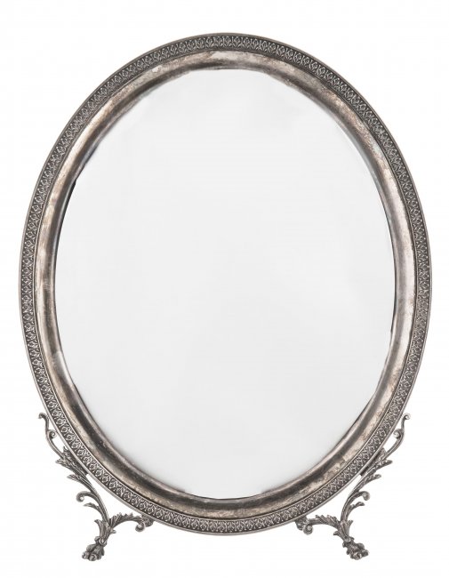 Lustro, Włochy, XX w.
Owalne lustro toaletowe z podpórką; srebro pr. 800.

Wymiary: 36x29 cm